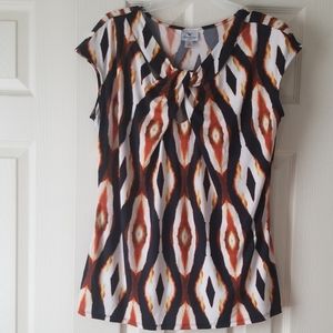 Black, white and rusty orange brown top